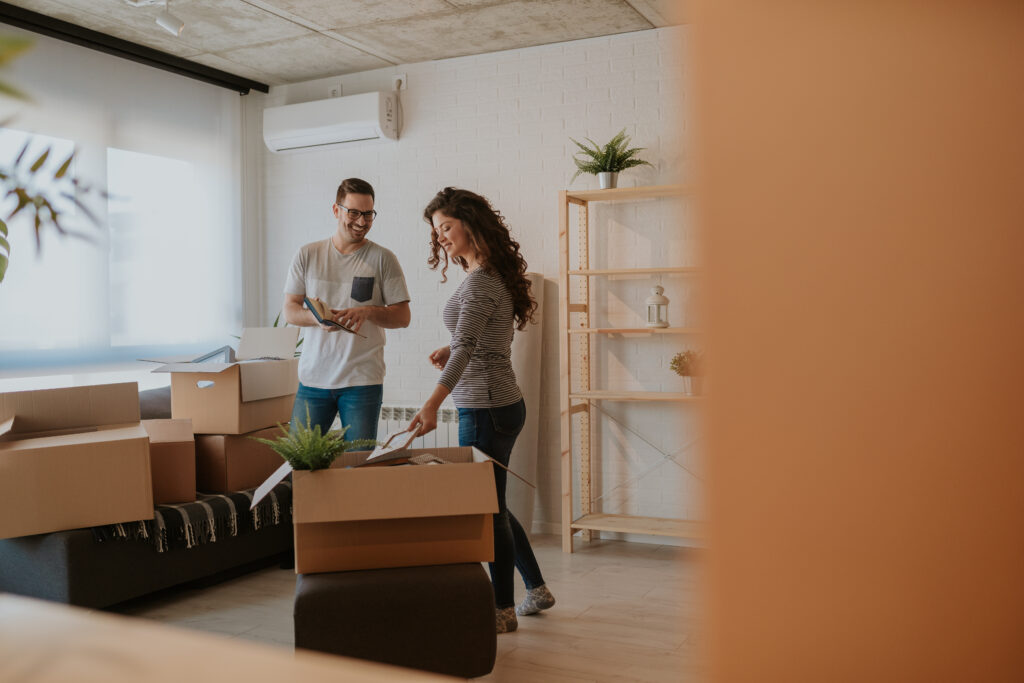 man and woman packing up